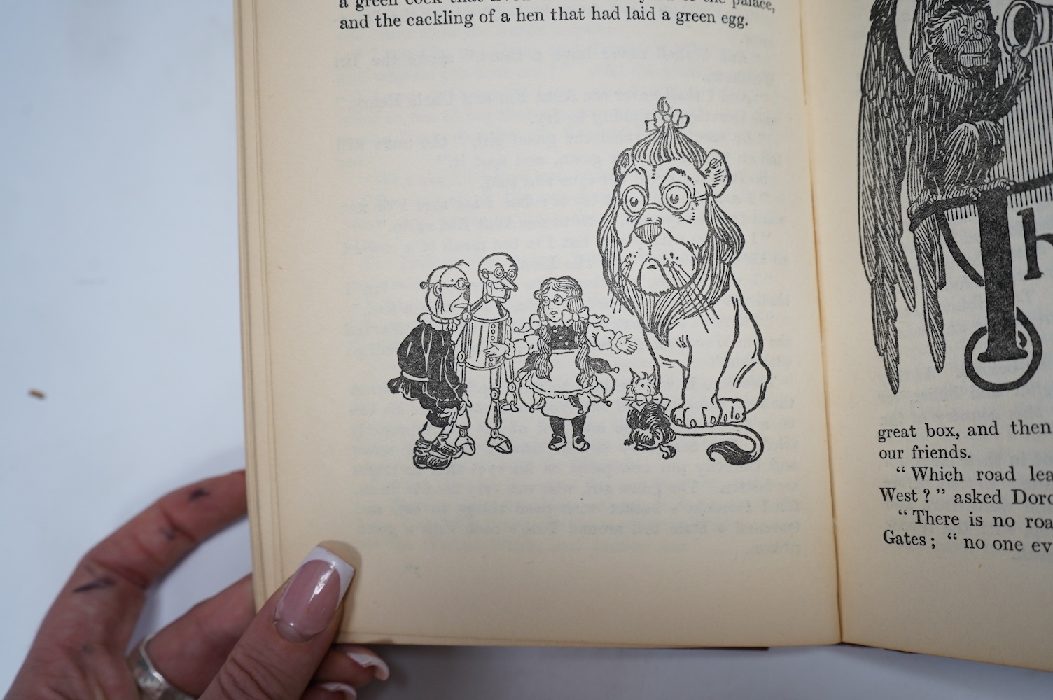 Baum, Frank - The Wizard of Oz, illustrated by W.W. Denslow, 12mo, pictorial front board over red cloth, Hutchinson & Co, London, [1926].